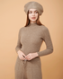 A front view of a plain cashmere sweater showing the fit , 100% Cashmere ,DAVINII