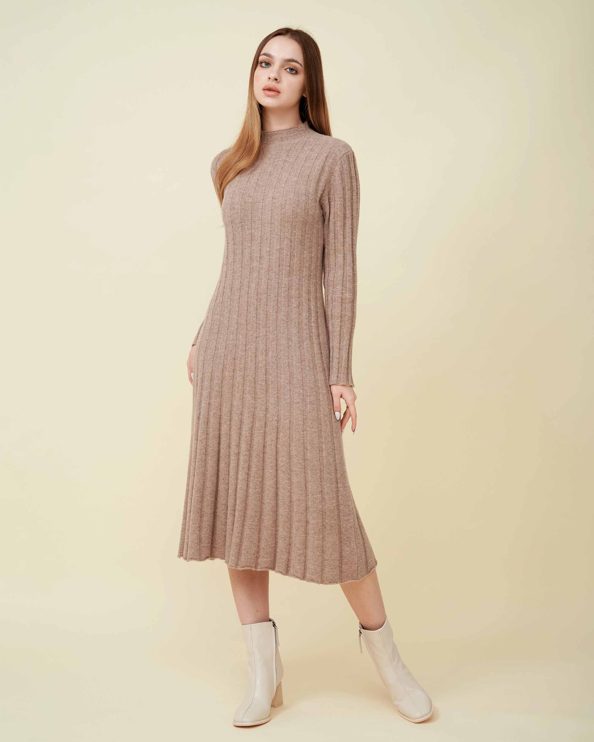 A front view of a wool sweater dress , rib knit texture , Confident look , DAVINII
