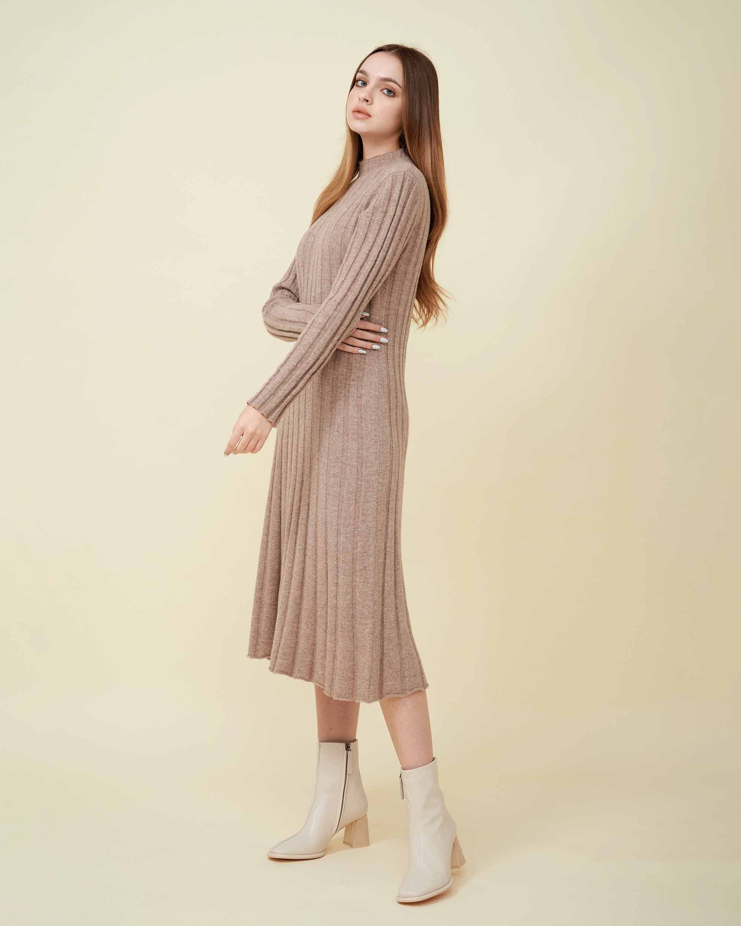 A front view of a wool sweater dress , rib knit texture , Confident look , DAVINII