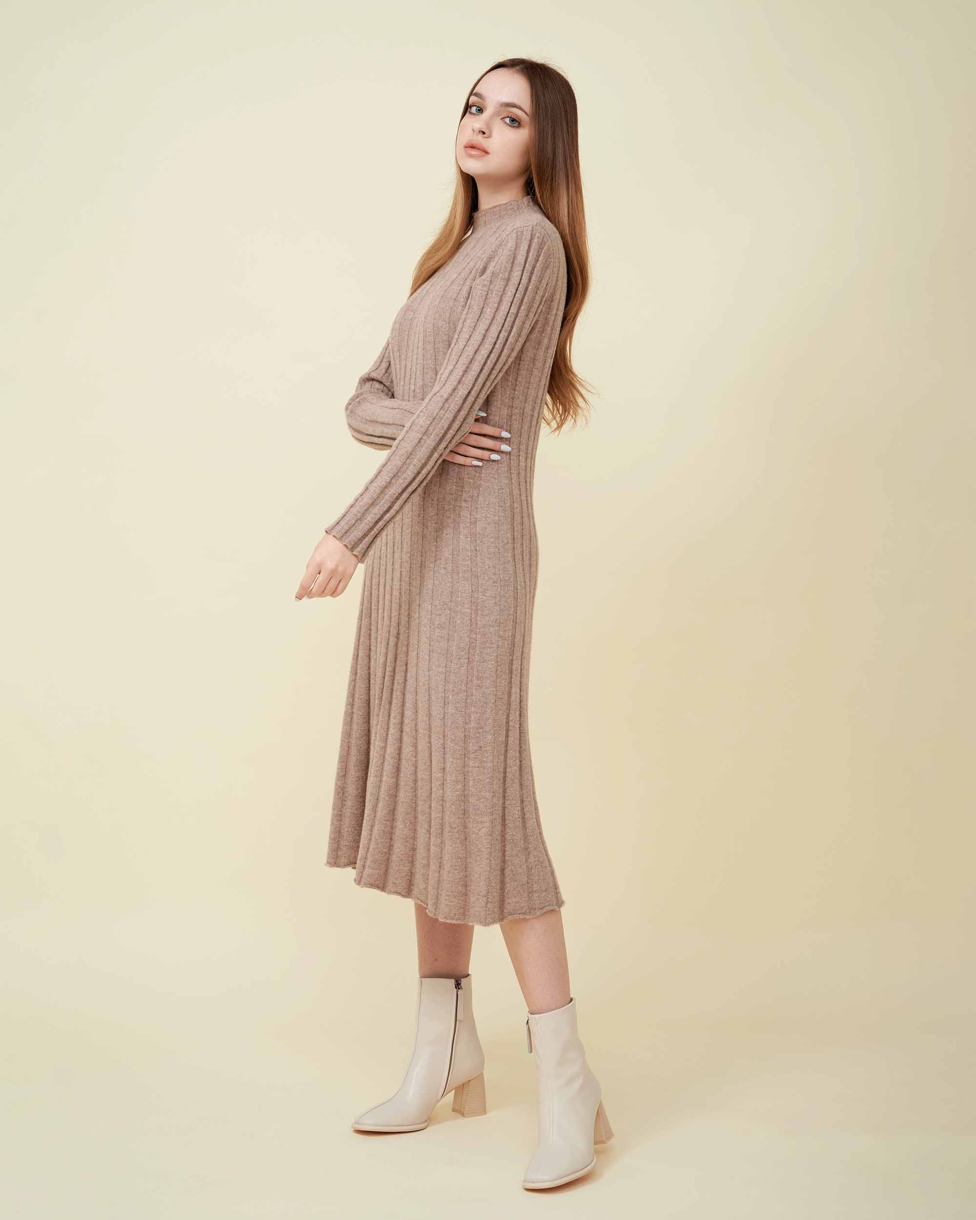 A front view of a wool sweater dress , rib knit texture , Confident look , DAVINII
