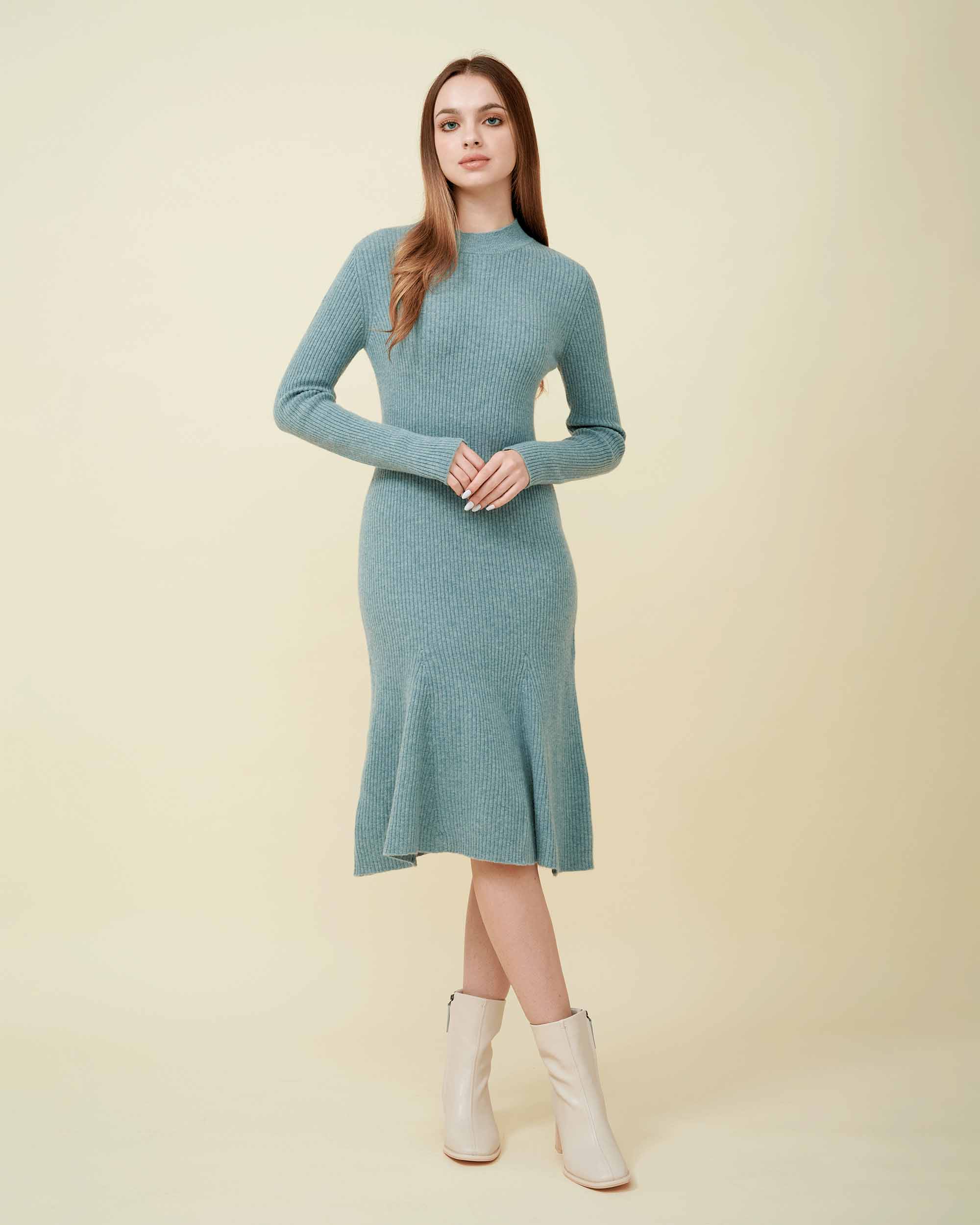 A front view of a wool sweater dress , rib knit texture , Confident look ,100% cashmere DAVINII