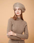 A front view of a plain cashmere sweater in taupe showing the fit , 100% Cashmere ,DAVINII