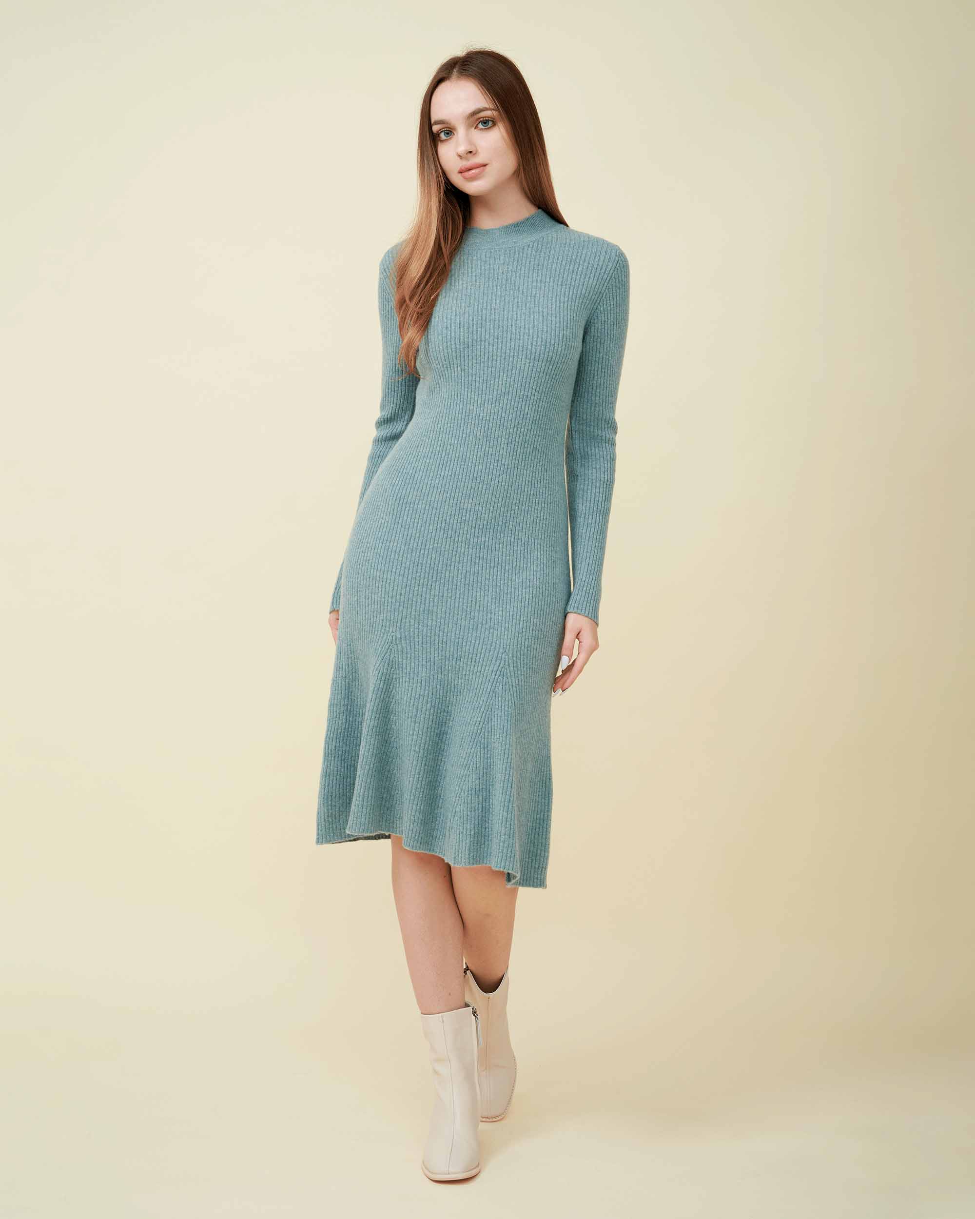 A front view of a wool sweater dress , rib knit texture , Confident look ,100% cashmere DAVINII