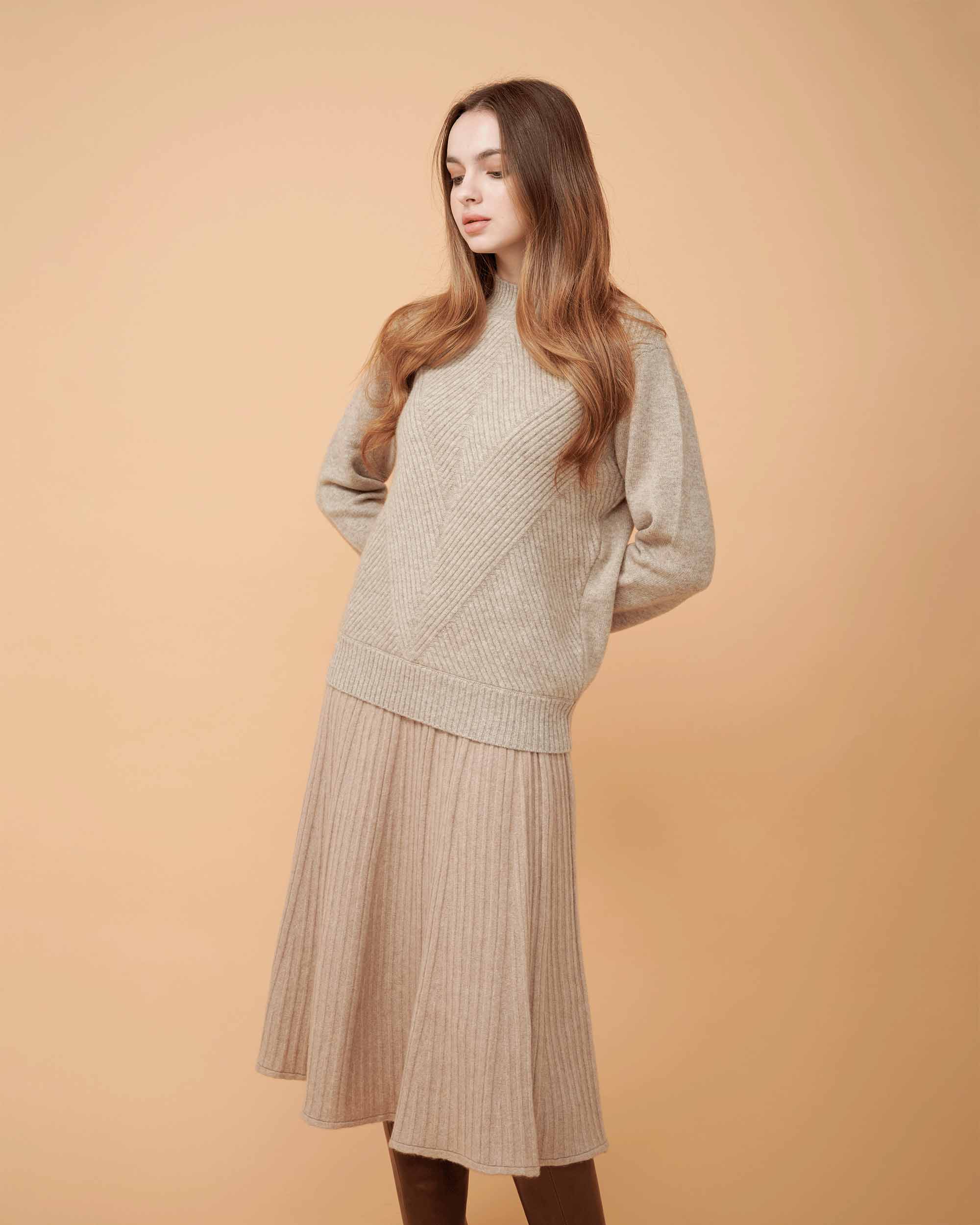 A front view of a cashmere sweater .sleek and sliming , very smooth & very comfy , DAVINII