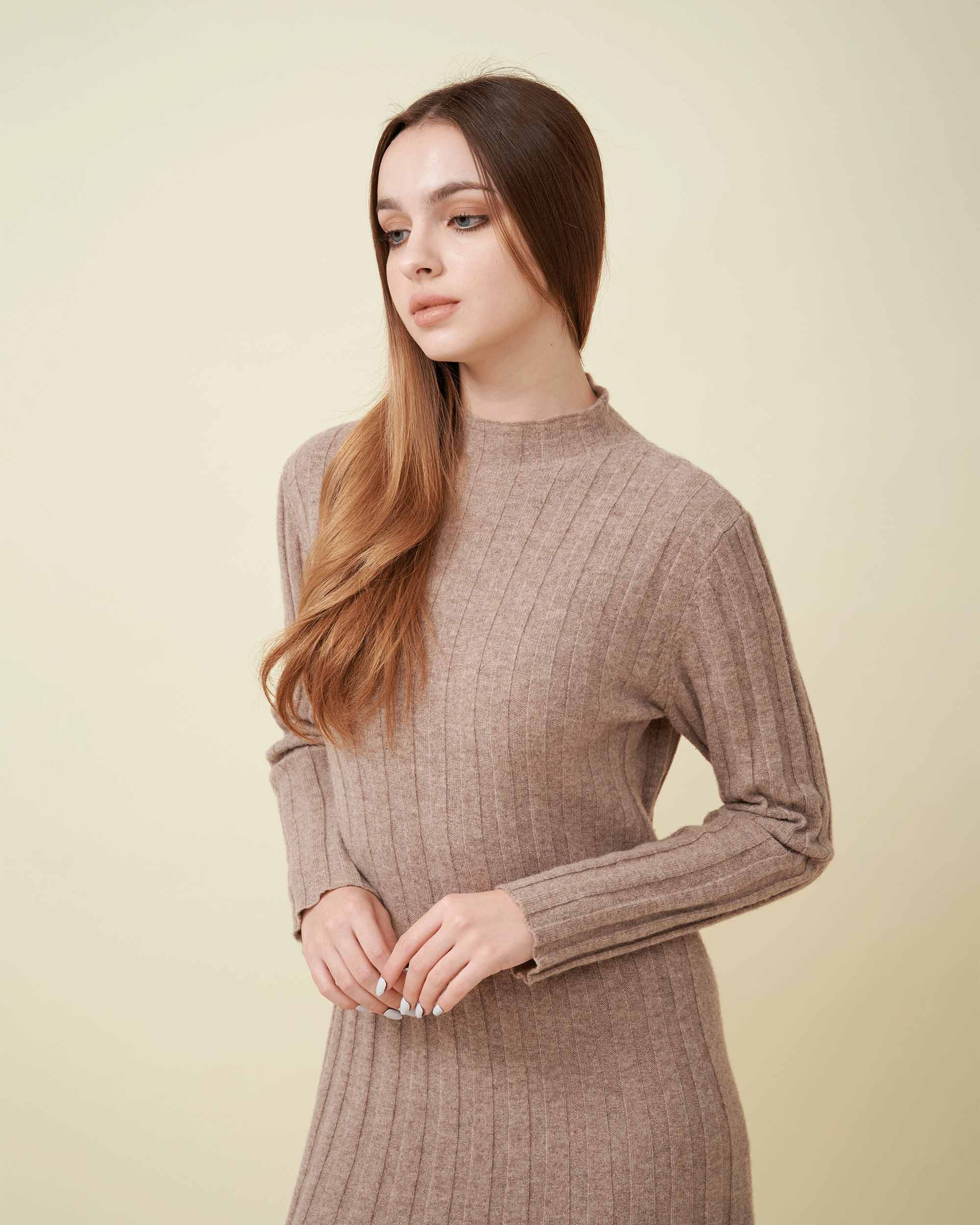 A front view of a wool sweater dress , rib knit texture , Confident look , DAVINII