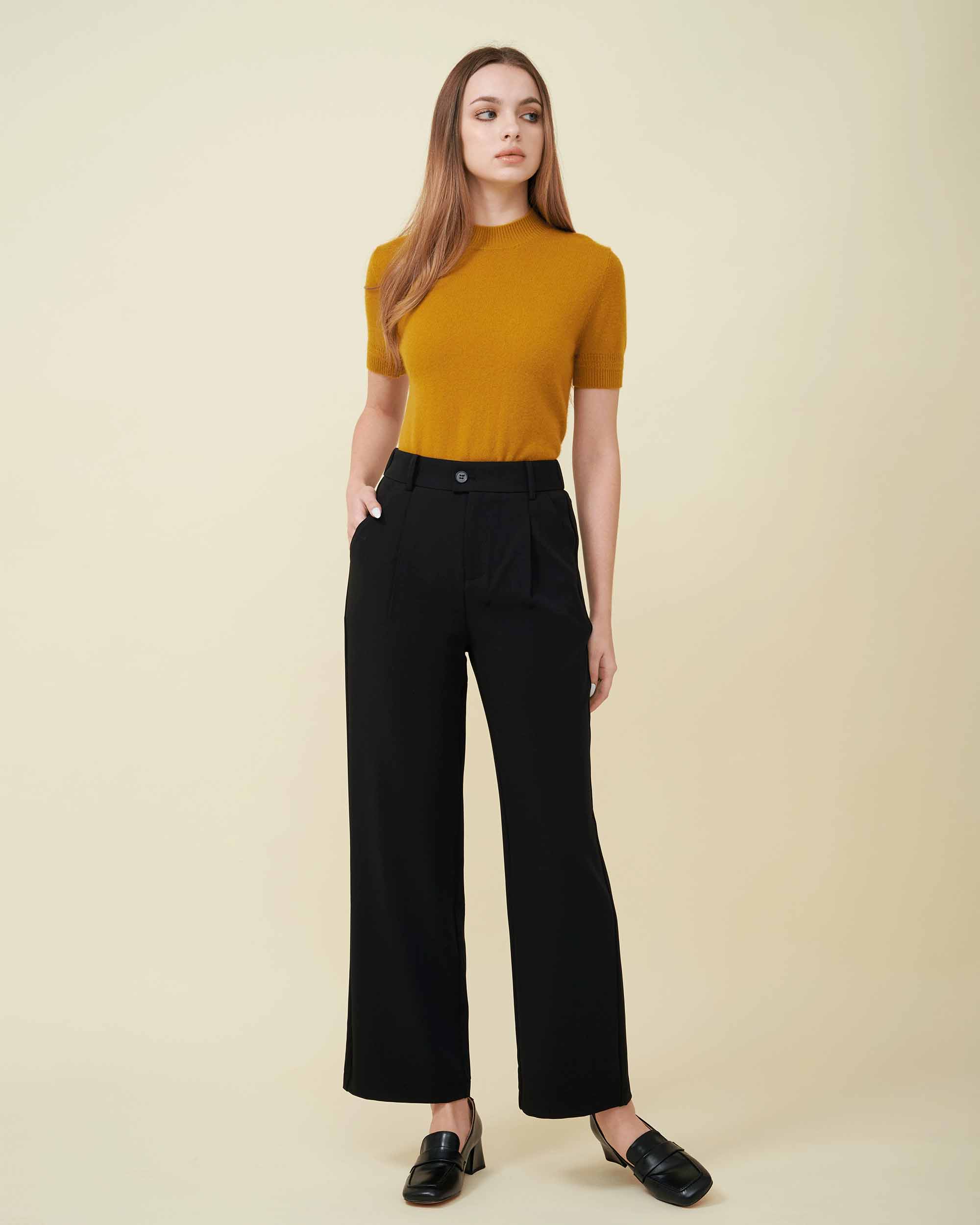 A front view of a cashmere pullover in mustard showing the fit , Smooth and skin friendly cashmere