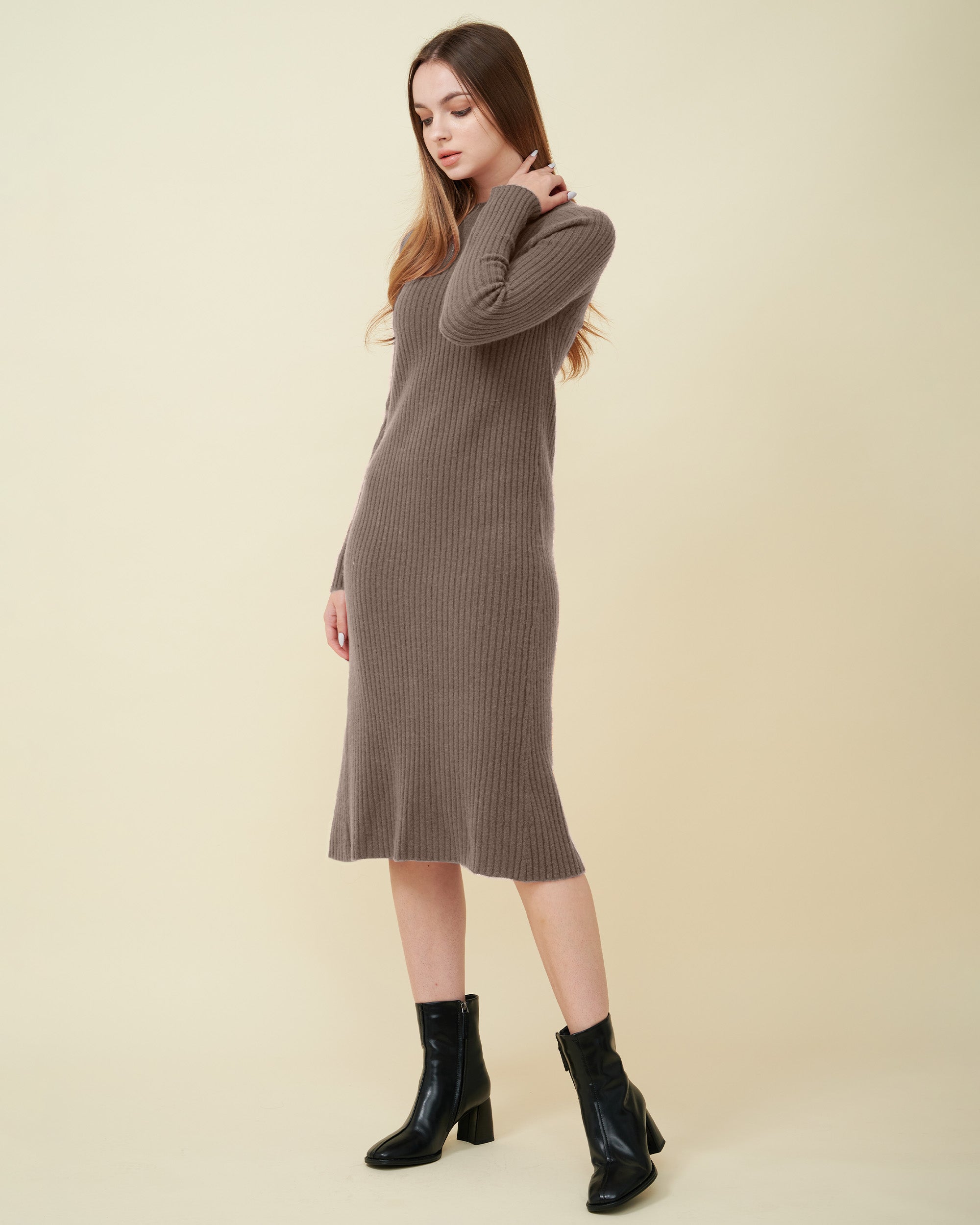 A front view of a wool sweater dress , rib knit texture , Confident look , DAVINII