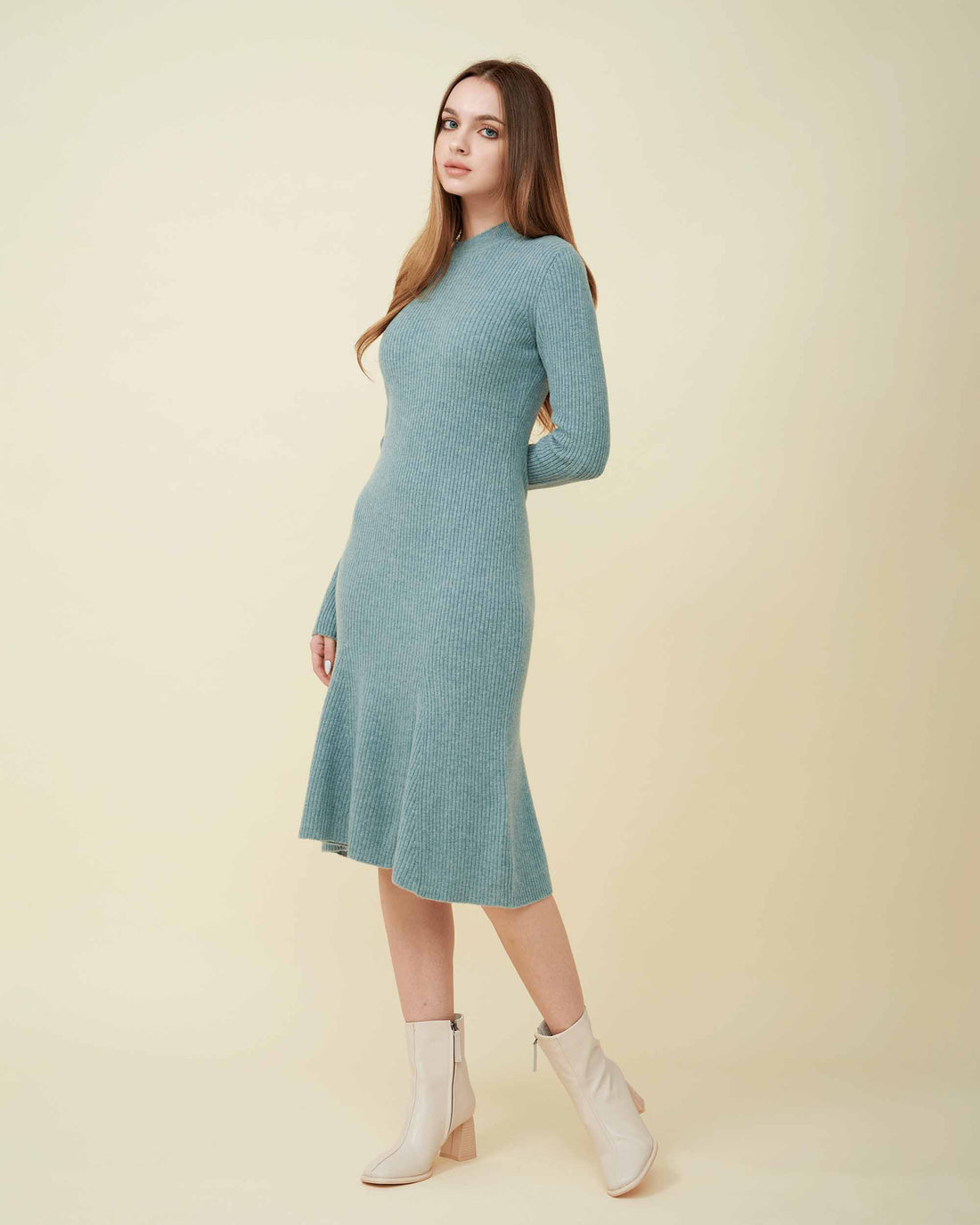A front view of a wool sweater dress , rib knit texture , Confident look ,100% cashmere DAVINII