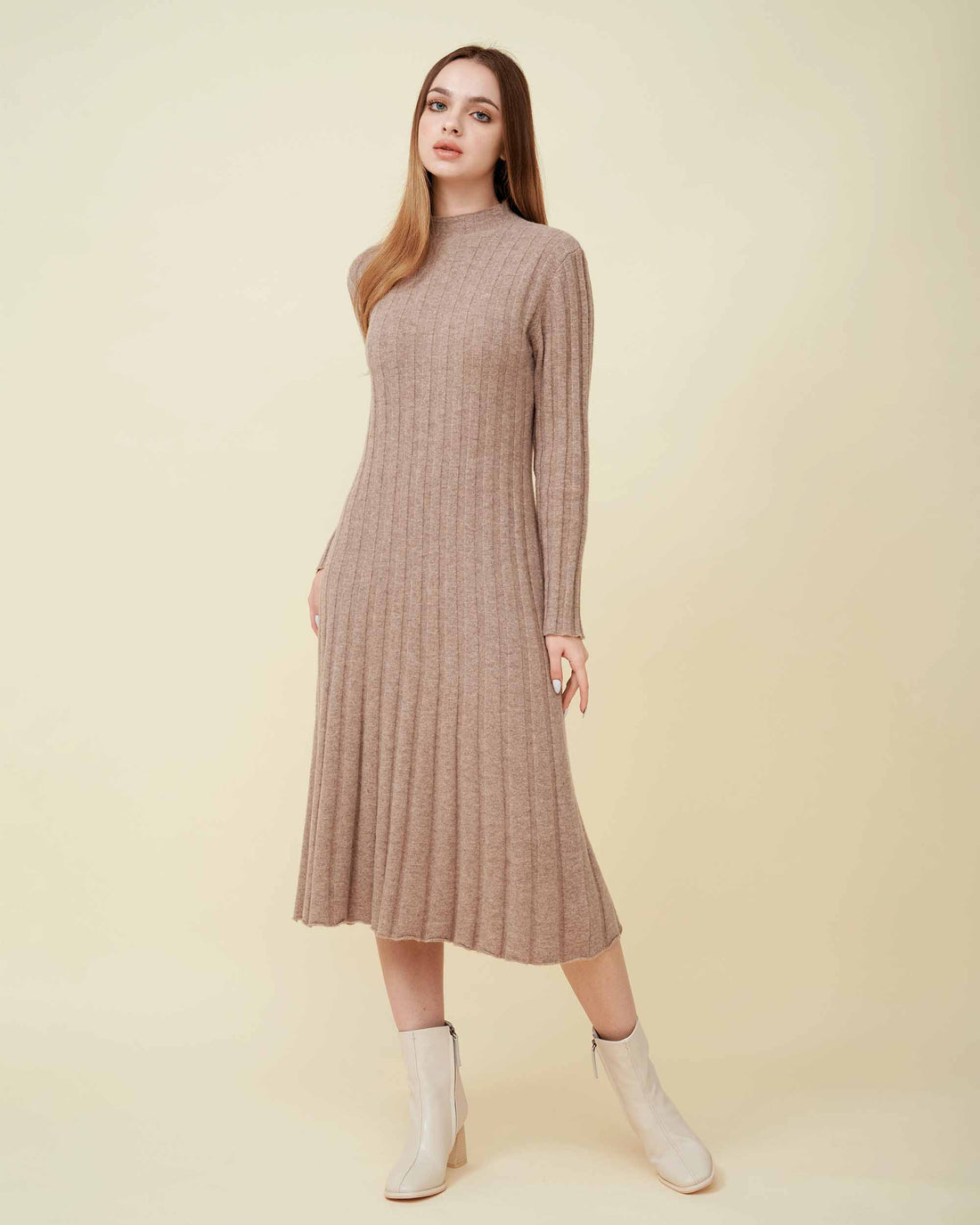 A front view of a  wool sweater dress , rib knit texture , Confident look , DAVINII