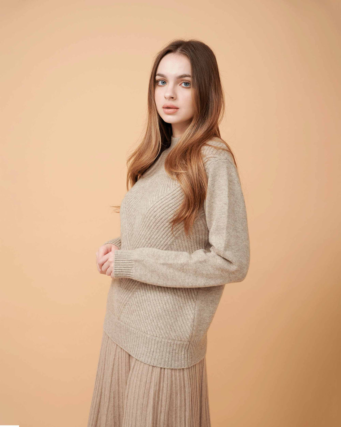 A front view of a cashmere sweater .sleek and sliming , very smooth & very comfy , DAVINII