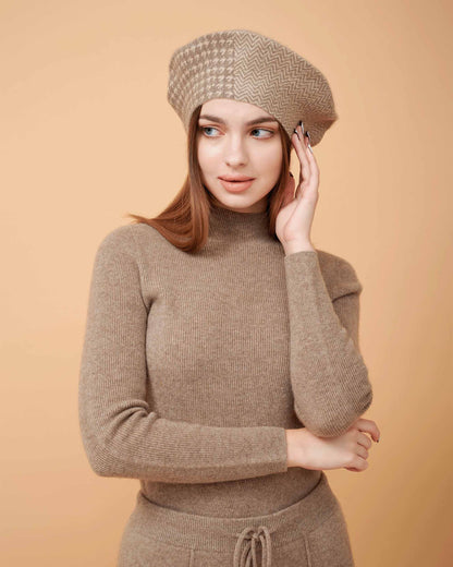 A front view of a plain cashmere sweater in taupe showing the fit , 100% Cashmere ,DAVINII