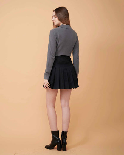 A back view of a button-down cashmere sweater in Grey showing the fit , 100% Cashmere ,DAVINII